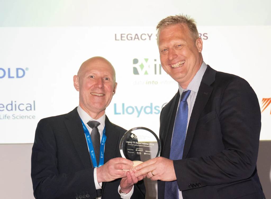 David Webb awarding Colin Richman with 15 year legacy award at CPC London 2026